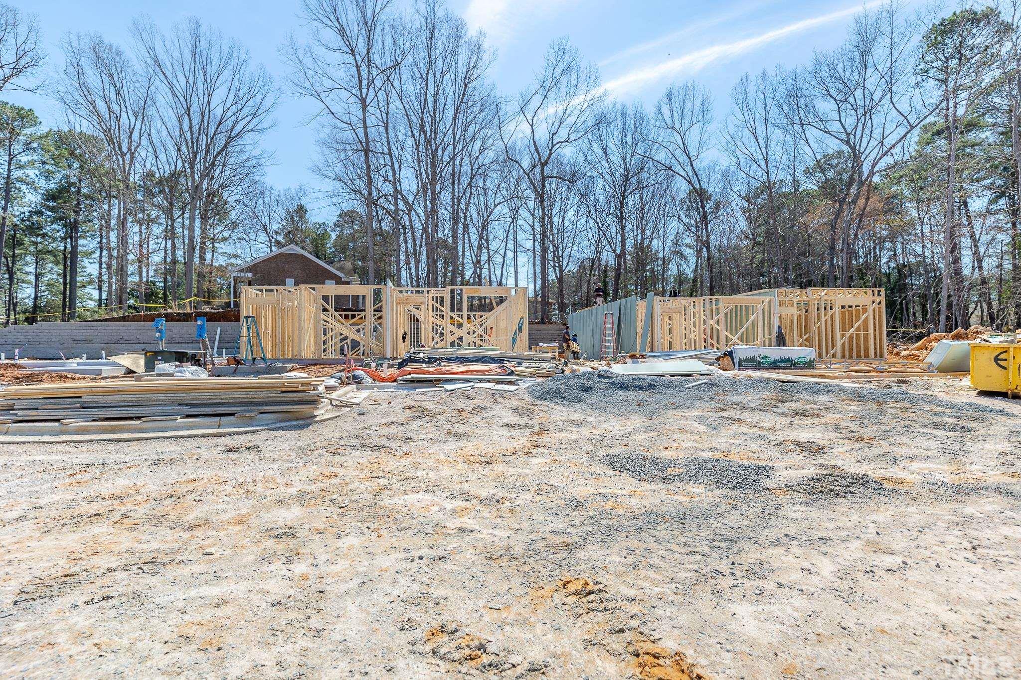 5705 Tall Pines Court Raleigh, NC 27609 - Photo 13 of 36 a view of backyard with large tree and wooden fence