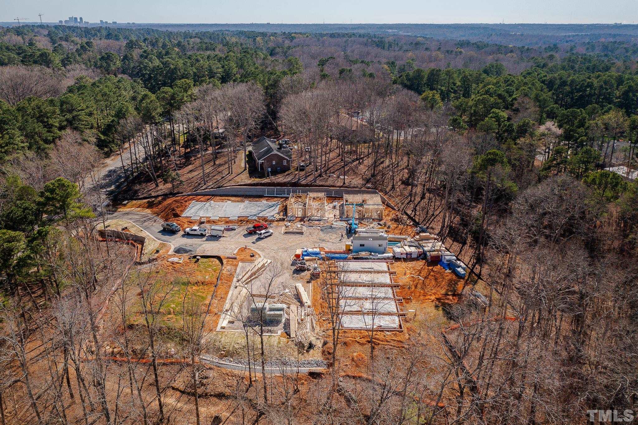 5705 Tall Pines Court Raleigh, NC 27609 - Photo 16 of 36 an aerial view of multiple house