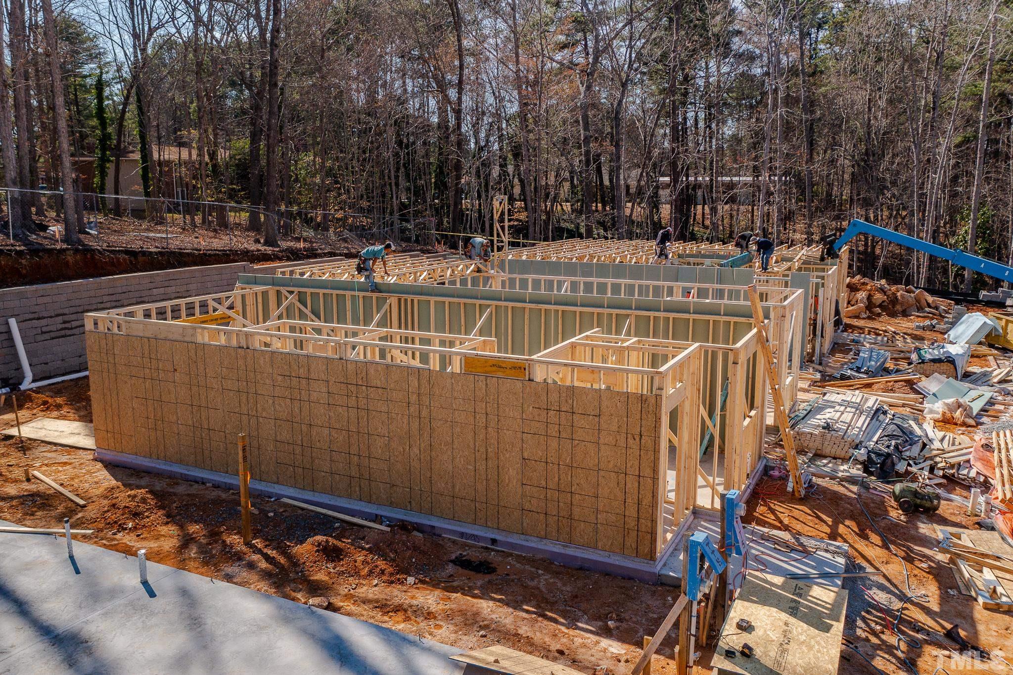 5705 Tall Pines Court Raleigh, NC 27609 - Photo 18 of 36 a view of swimming pool with outdoor seating and trees