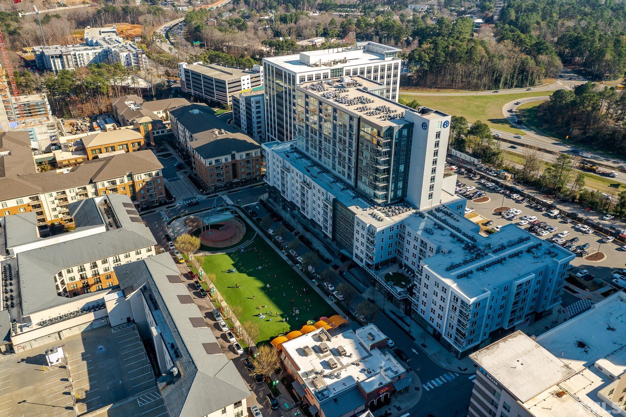 5705 Tall Pines Court Raleigh, NC 27609 - Photo 20 of 36 a city view with tall buildings