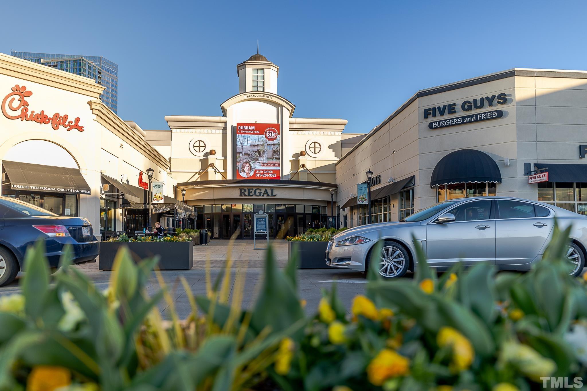 5705 Tall Pines Court Raleigh, NC 27609 - Photo 24 of 36 a front view of a house with garden