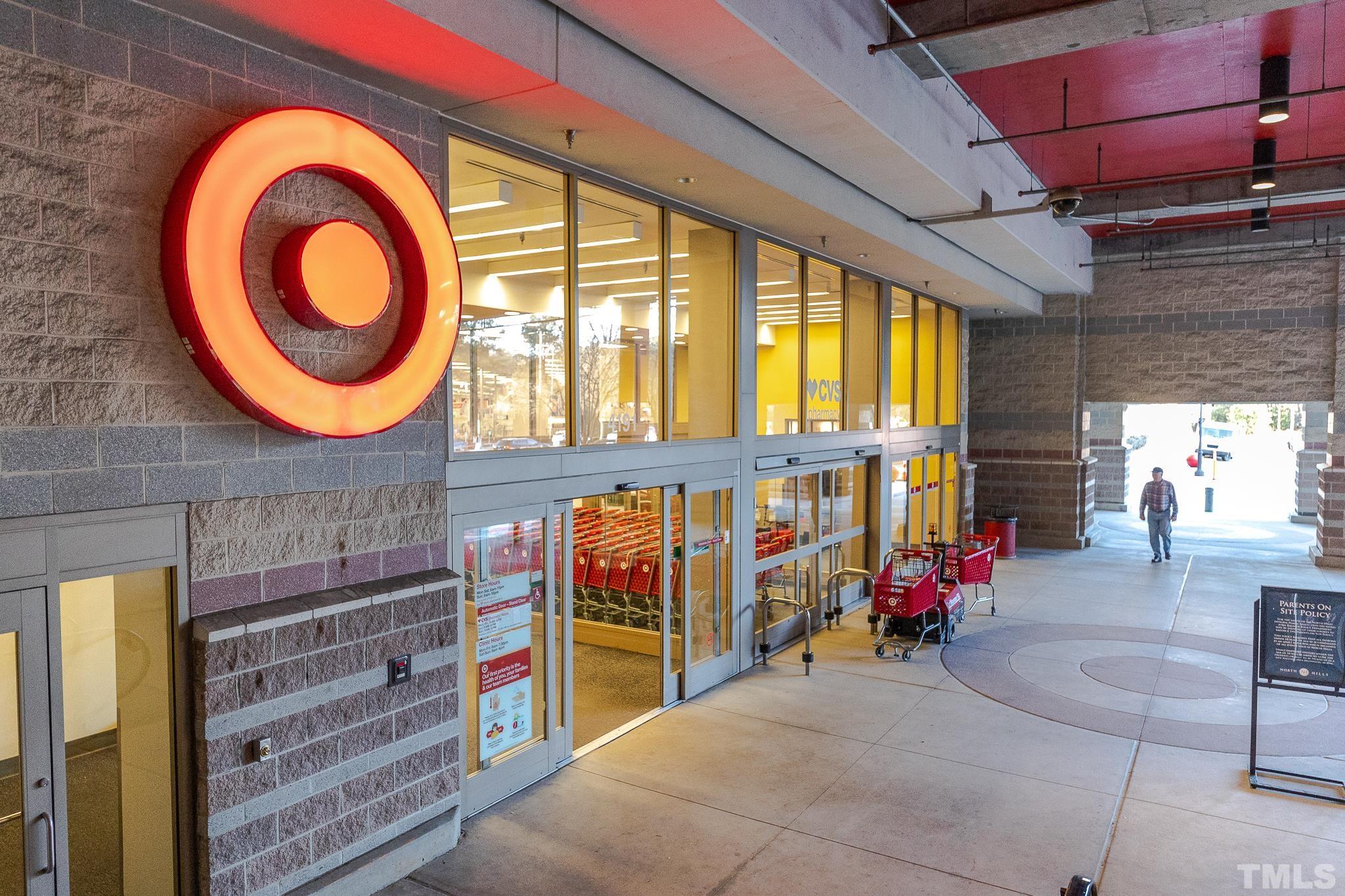 5705 Tall Pines Court Raleigh, NC 27609 - Photo 25 of 36 a backyard of a house with seating space