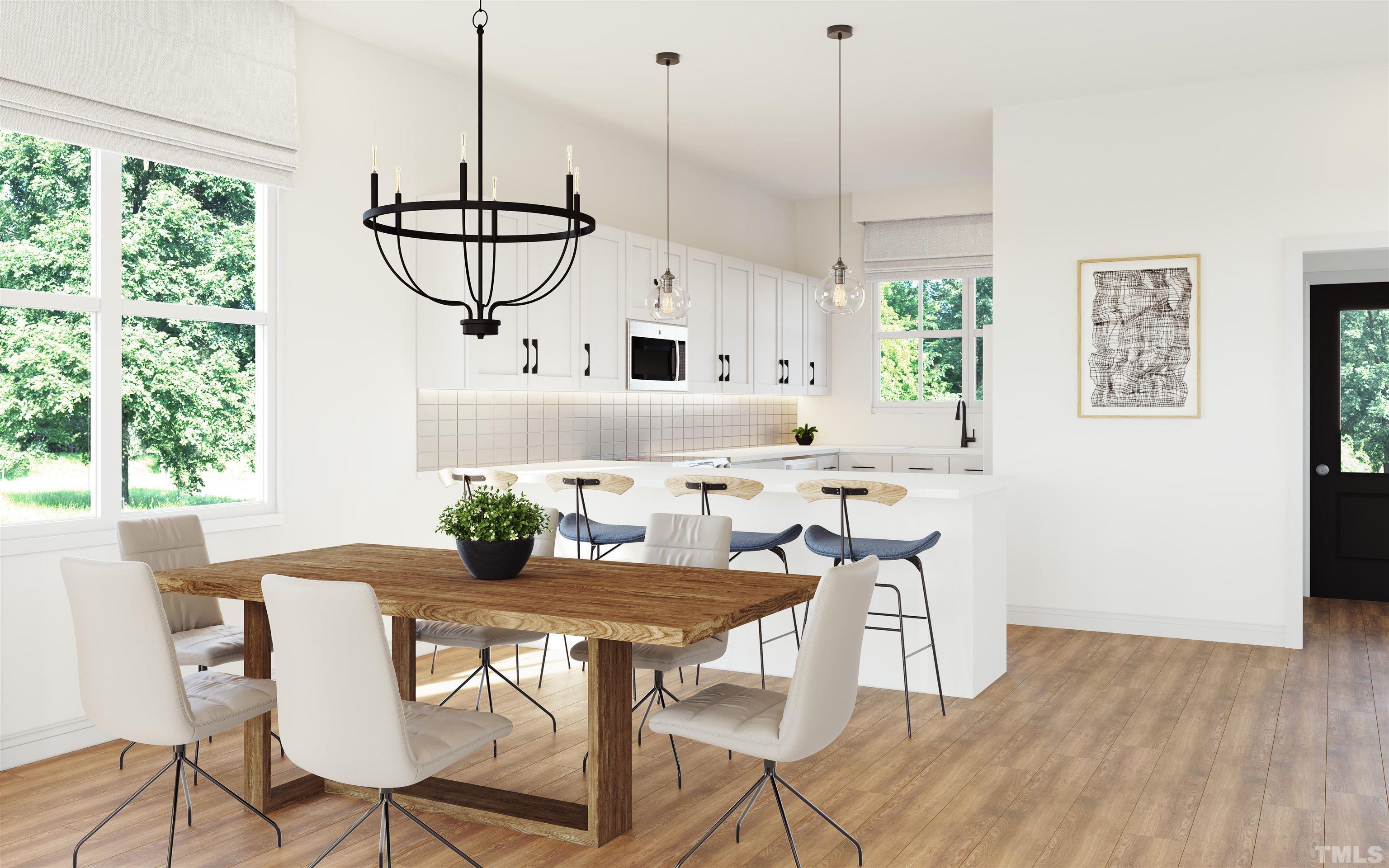 5705 Tall Pines Court Raleigh, NC 27609 - Photo 3 of 36 a view of a dining room with furniture window and outside view