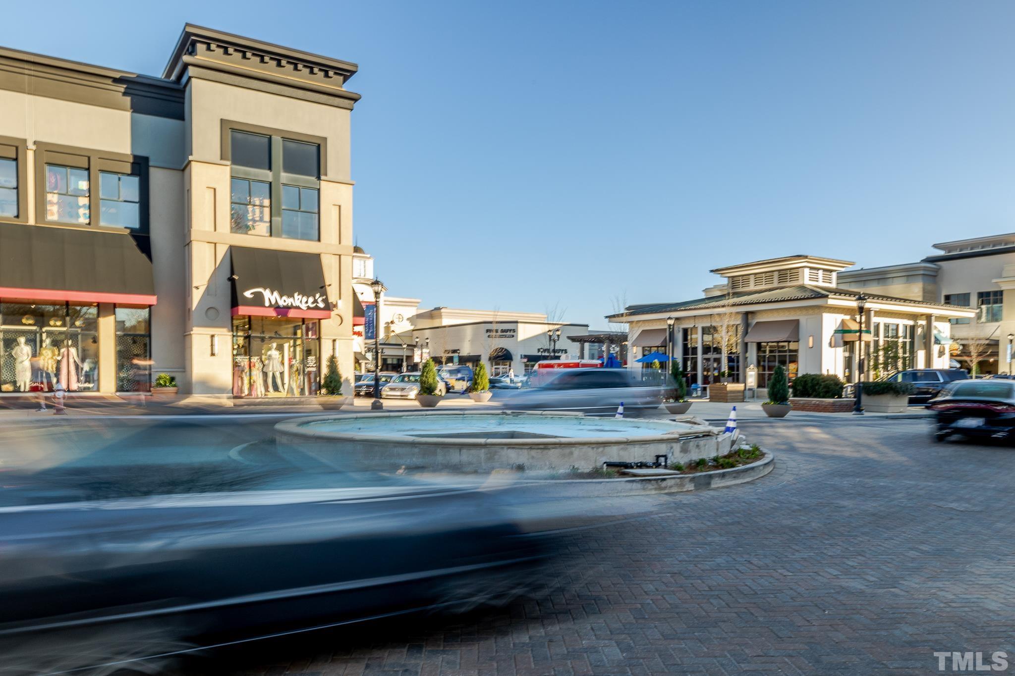 5705 Tall Pines Court Raleigh, NC 27609 - Photo 32 of 36 a car parked in front of a building