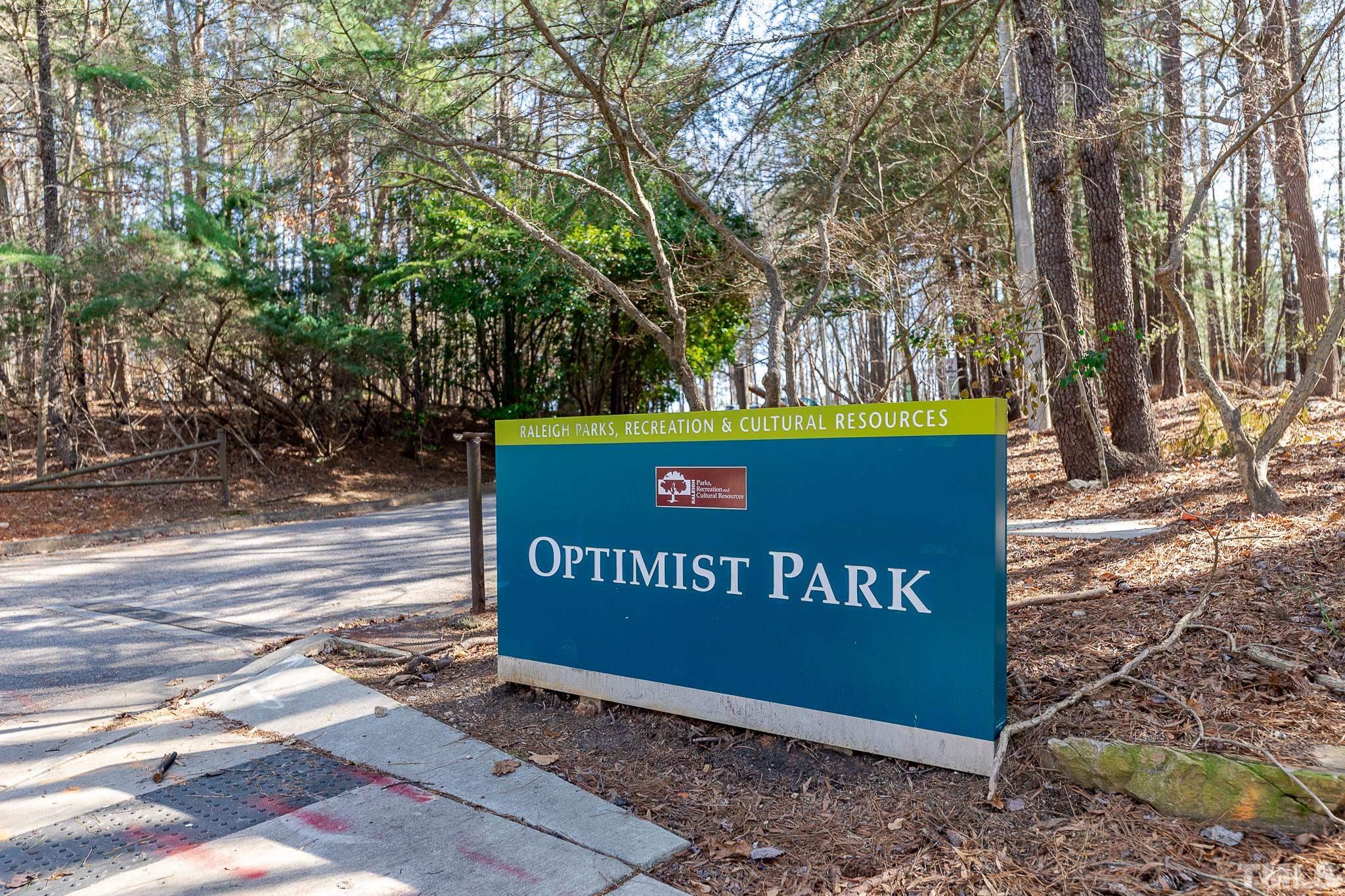 5705 Tall Pines Court Raleigh, NC 27609 - Photo 35 of 36 a sign on the side of the road