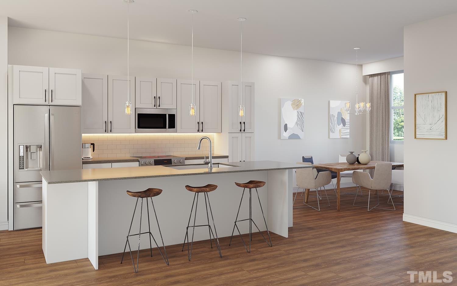 5705 Tall Pines Court Raleigh, NC 27609 - Photo 4 of 36 a kitchen with stainless steel appliances granite countertop a white cabinets and wooden floors