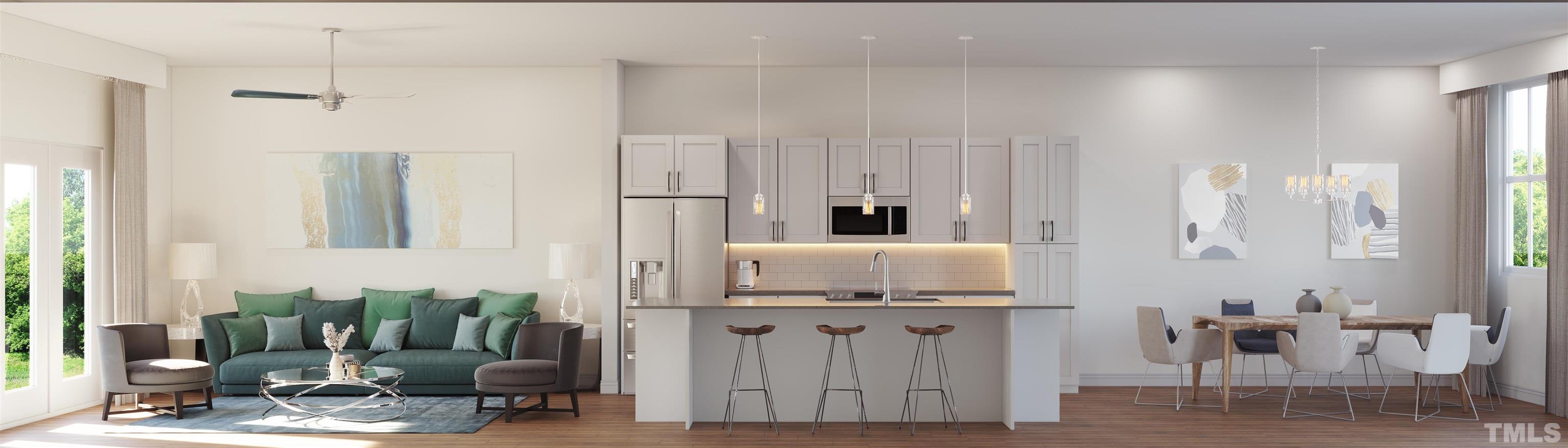 5705 Tall Pines Court Raleigh, NC 27609 - Photo 5 of 36 a kitchen with white cabinets and counter space