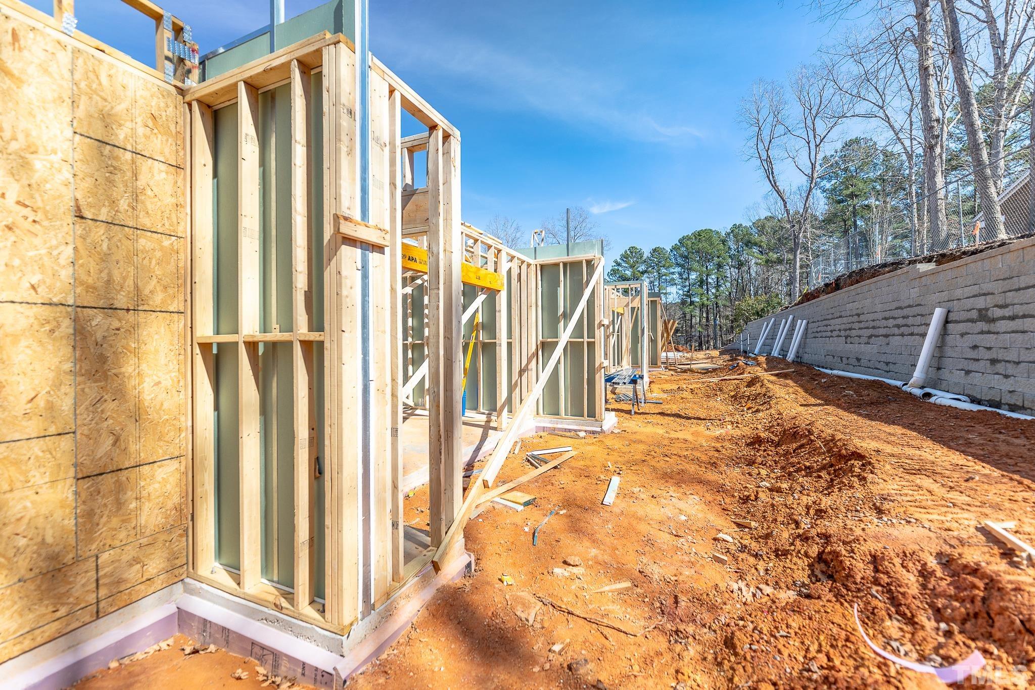 5705 Tall Pines Court Raleigh, NC 27609 - Photo 6 of 36 a view of a house with a backyard