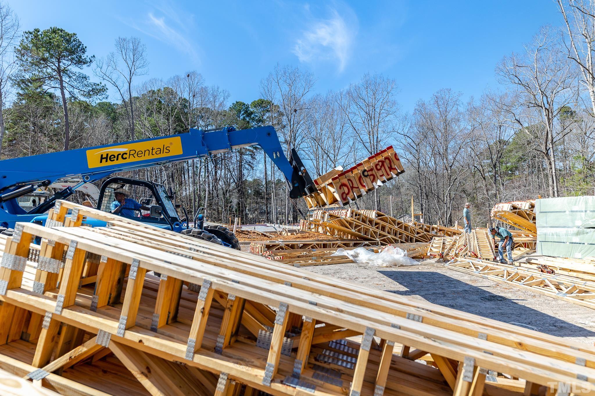 5705 Tall Pines Court Raleigh, NC 27609 - Photo 7 of 36 a view of a building with a park