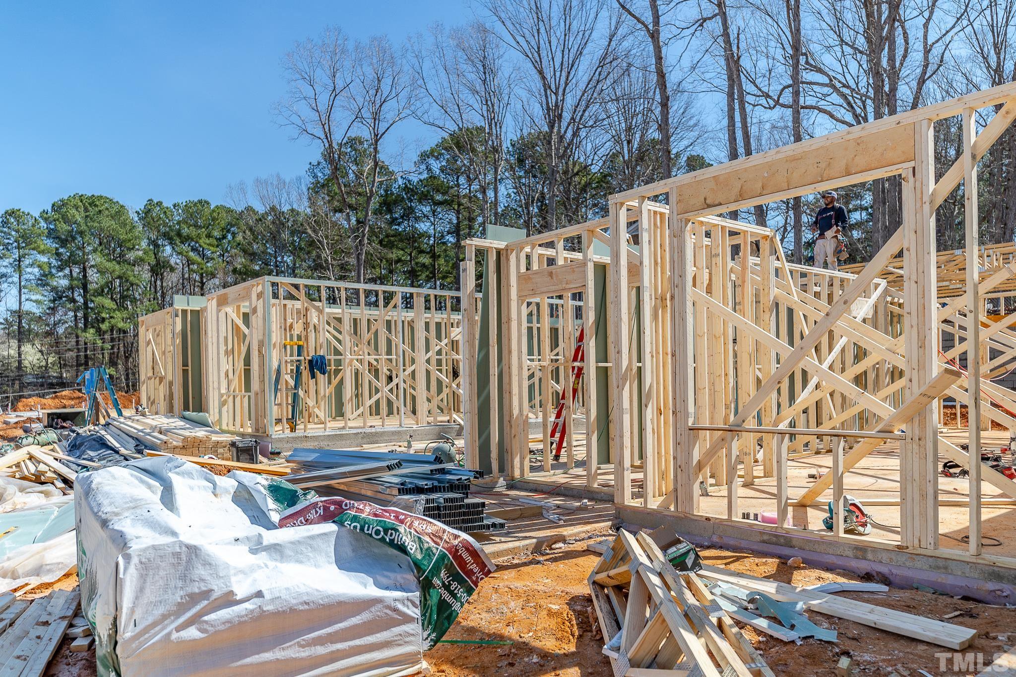 5705 Tall Pines Court Raleigh, NC 27609 - Photo 8 of 36 a view of balcony with wooden fence and trees