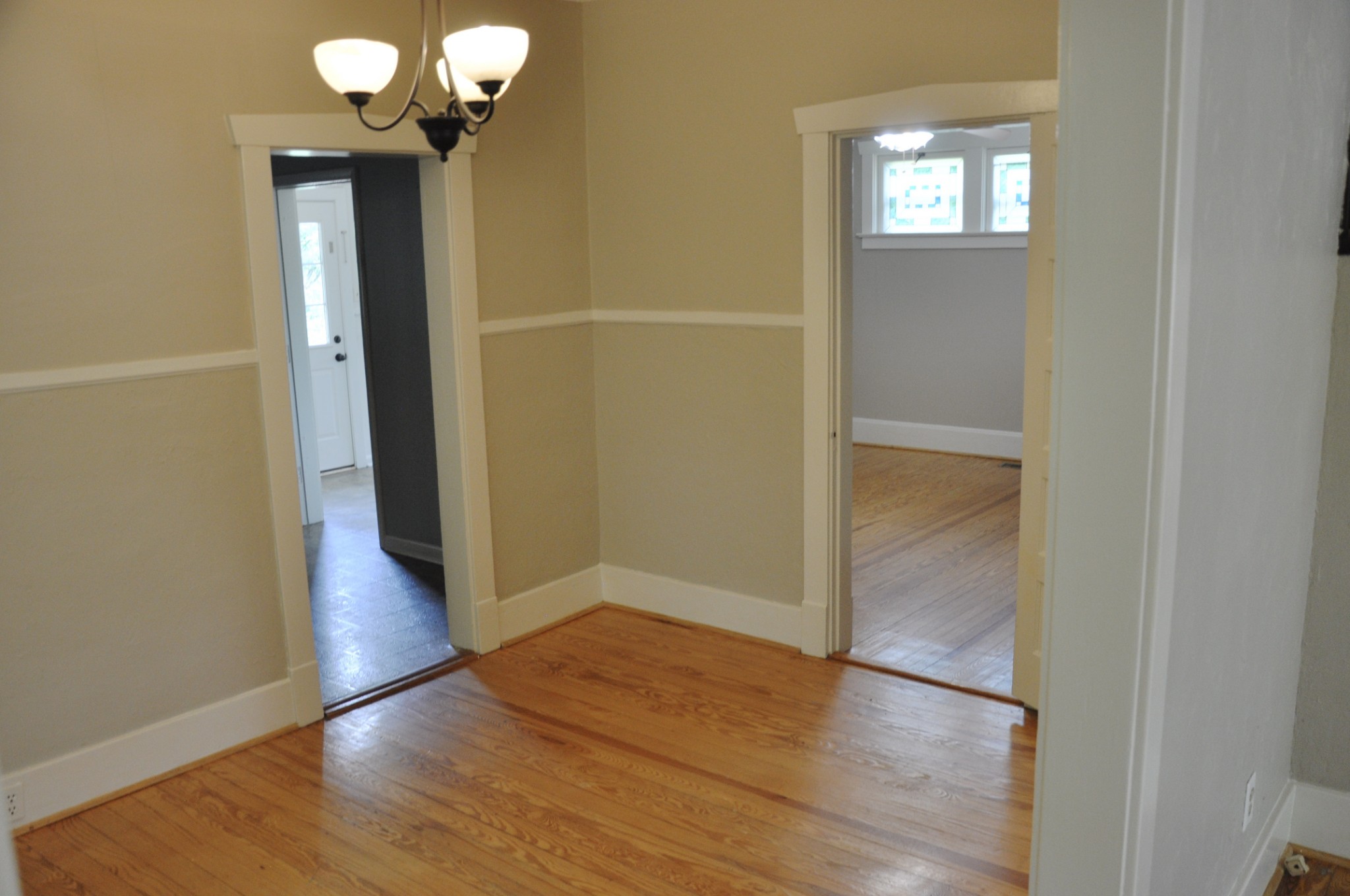 602 3rd Avenue West Springfield, TN 37172 - Photo 16 of 37 an empty room with wooden floor and windows