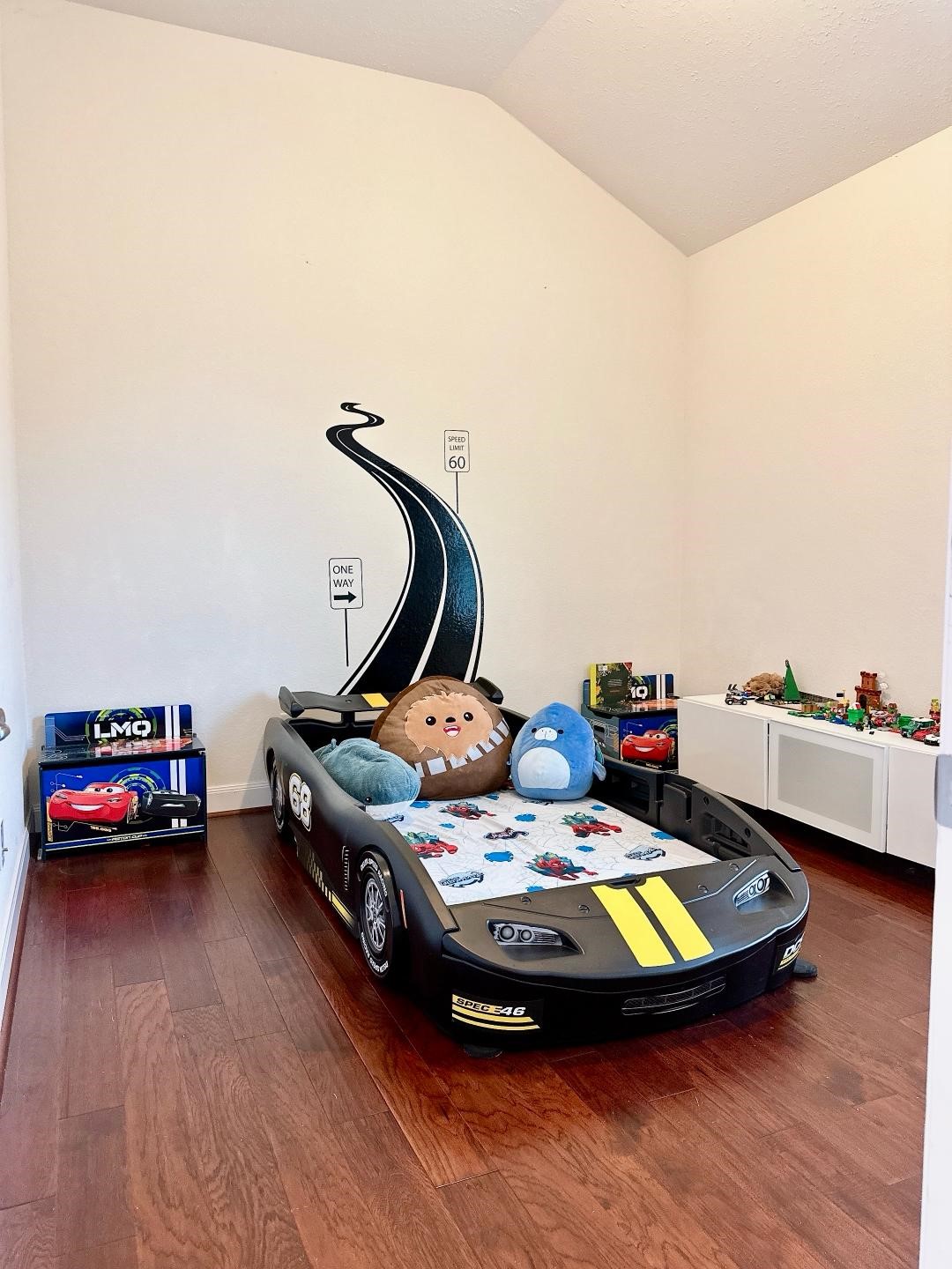 1110 Penny Ranch Lane Katy, TX 77494 - Photo 26 of 31 a room with furniture and wooden floor