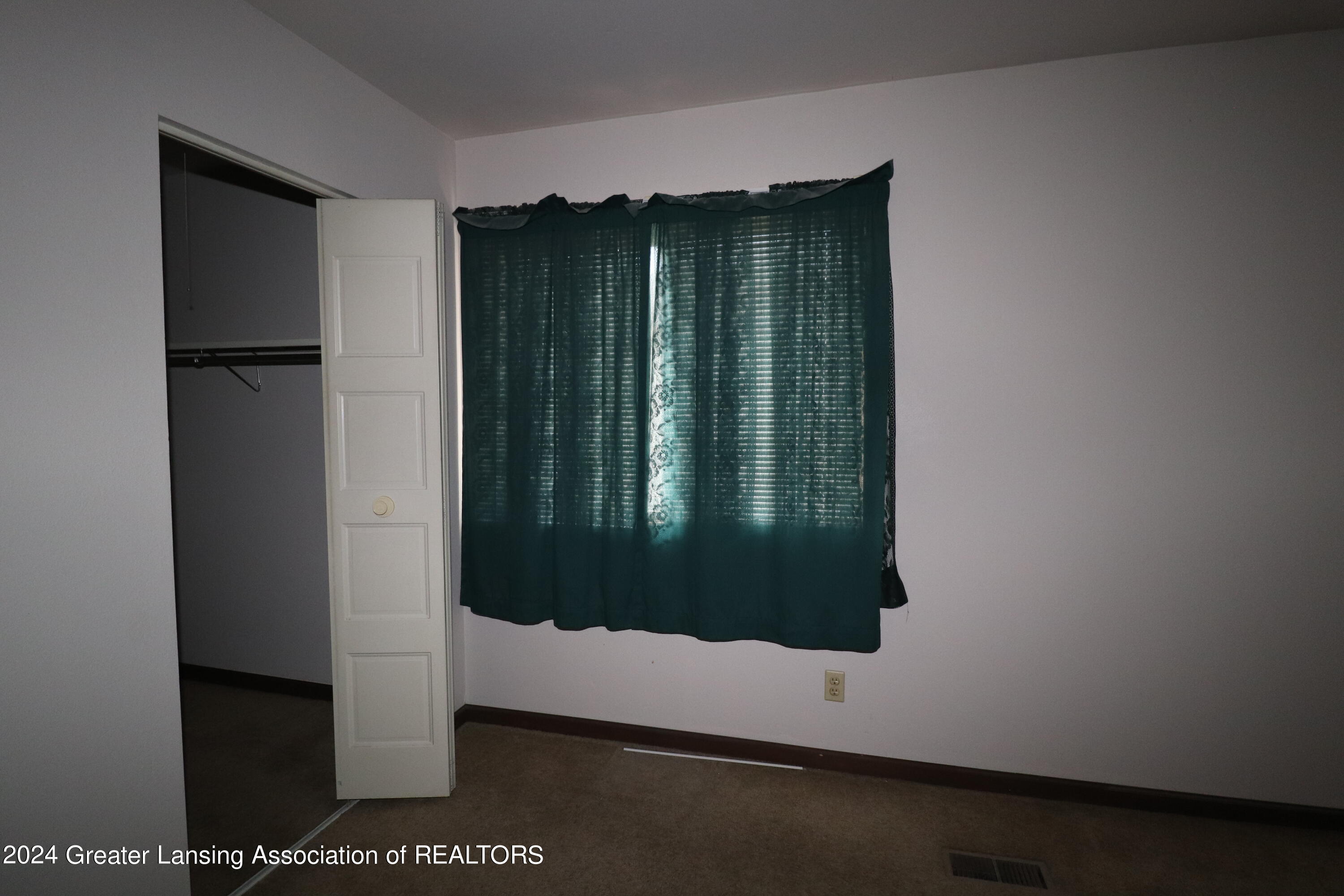 3930 Hunters Ridge Drive, Unit 4 Lansing, MI 48911 - Photo 13 of 18 IMG_6103