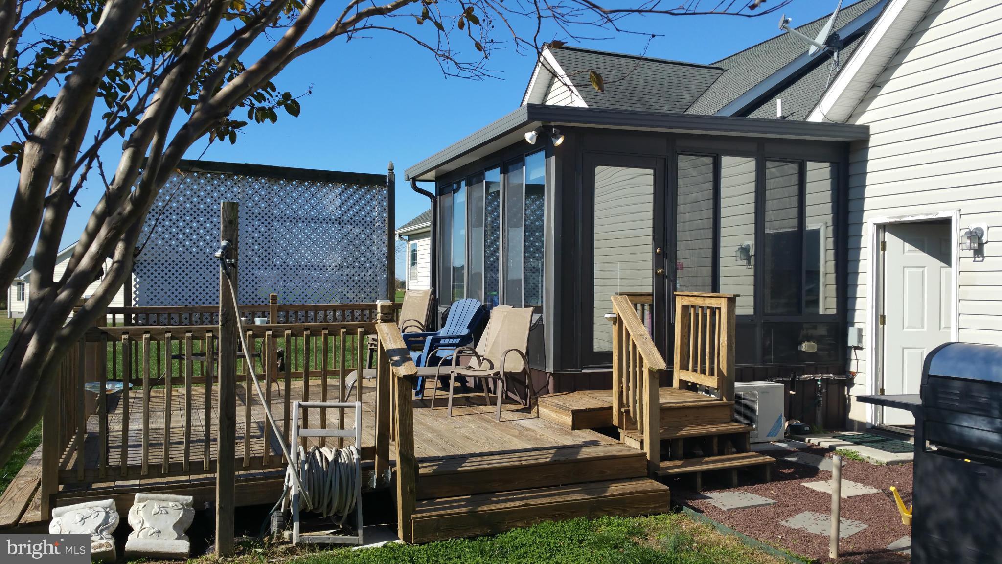 8488 Deer Run Road Denton, MD 21629 - Photo 10 of 24 Sun porch and deck