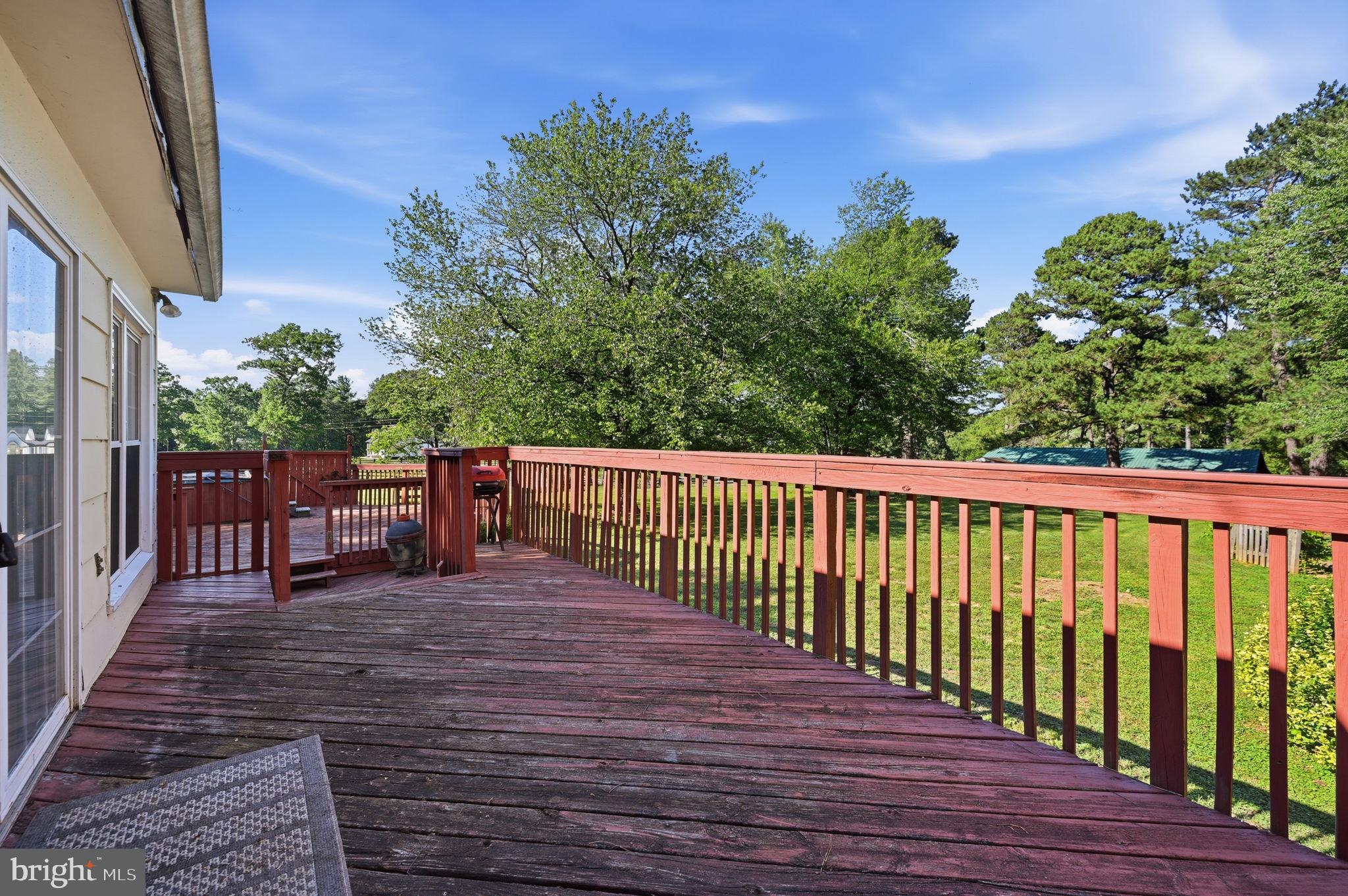 9337 Everona Road Unionville, VA 22567 - Photo 21 of 46 Spacious deck with serene views.