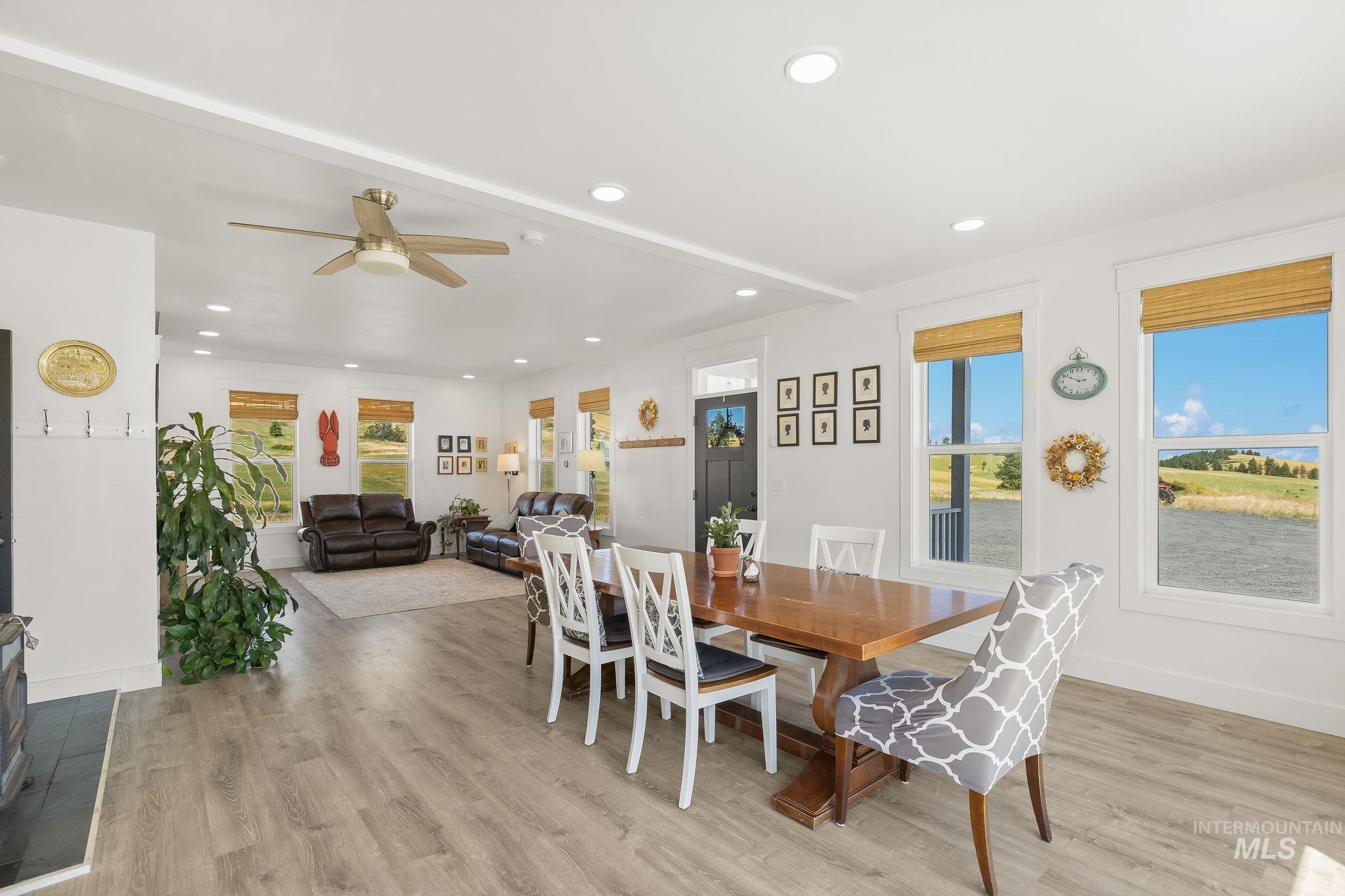 4935 Lenville Road Moscow, ID 83843 - Photo 16 of 49 Open-concept interior featuring wood-finish flooring, recessed lighting, and white trim