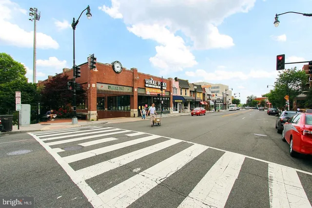 a view of a street with cars