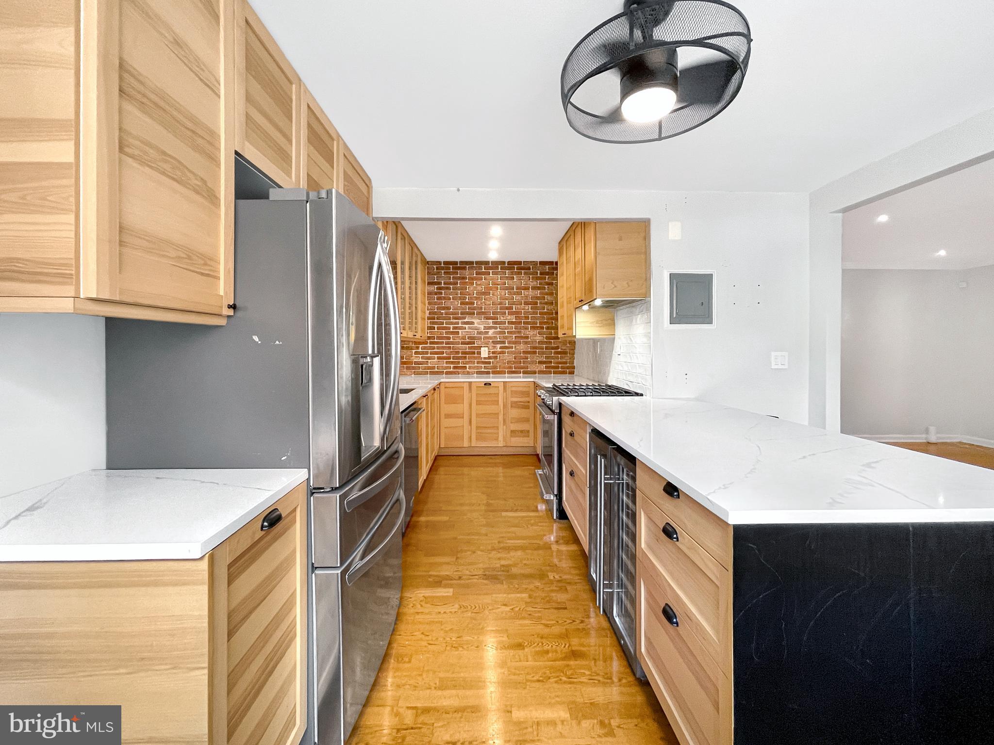 2725 39th Street Northwest, Unit 2O9 Washington, DC 20007 - Photo 8 of 35 a bathroom with a sink and a mirror