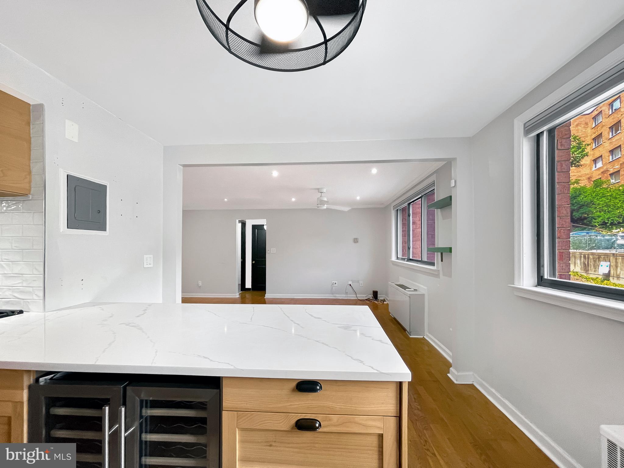 2725 39th Street Northwest, Unit 2O9 Washington, DC 20007 - Photo 10 of 35 a view of a room with furniture and a window