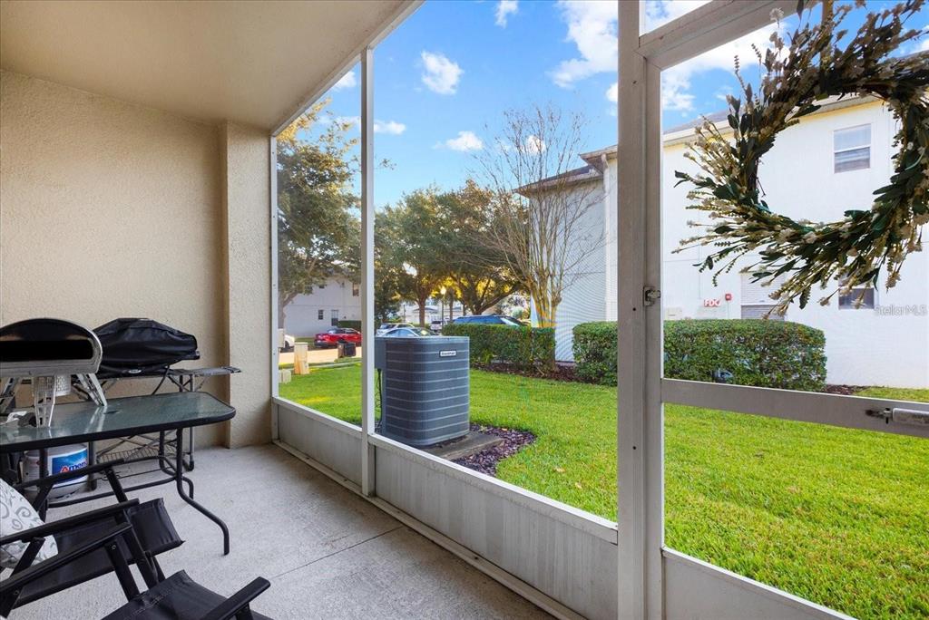 3115 Capri Isle Way Orlando, FL 32835 - Photo 23 of 40 a balcony with chairs