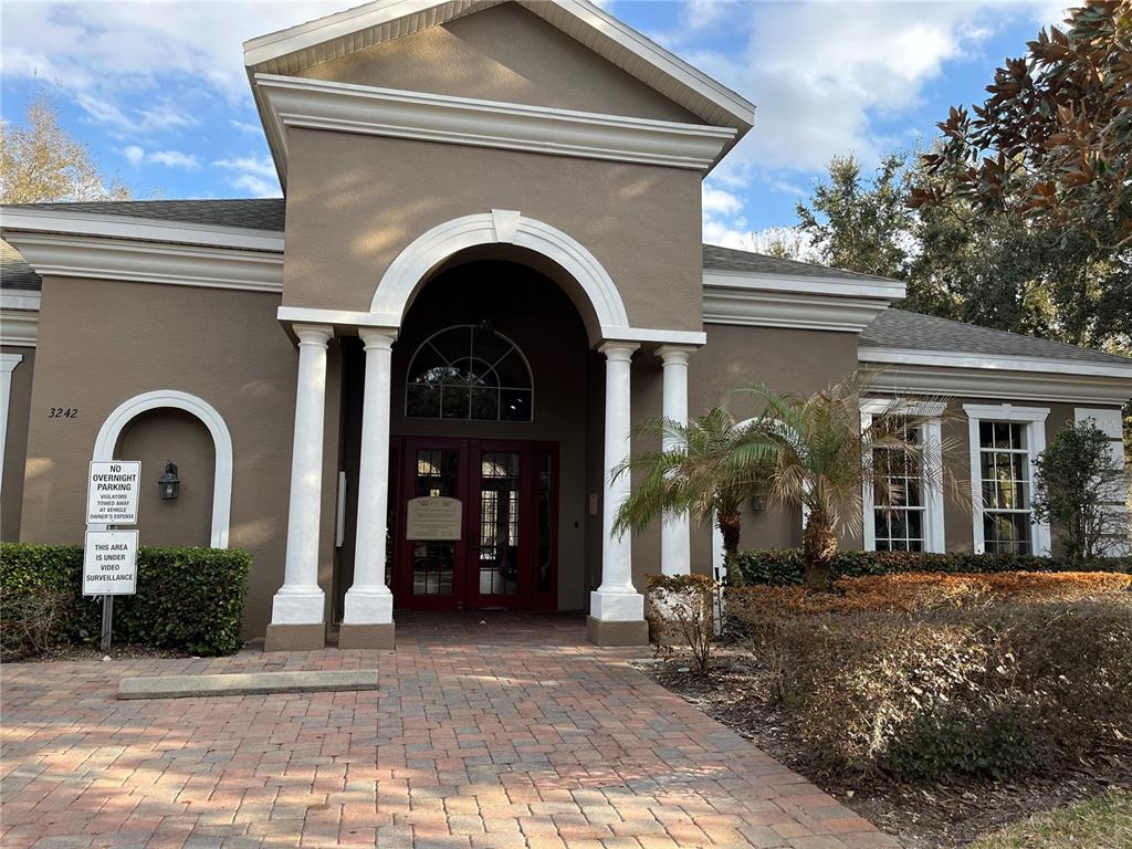 3115 Capri Isle Way Orlando, FL 32835 - Photo 36 of 40 a front view of a house