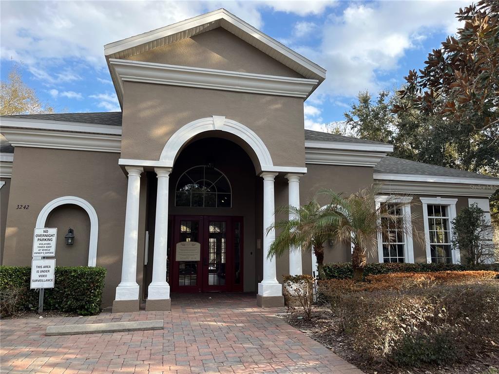 3115 Capri Isle Way Orlando, FL 32835 - Photo 37 of 40 a front view of a house