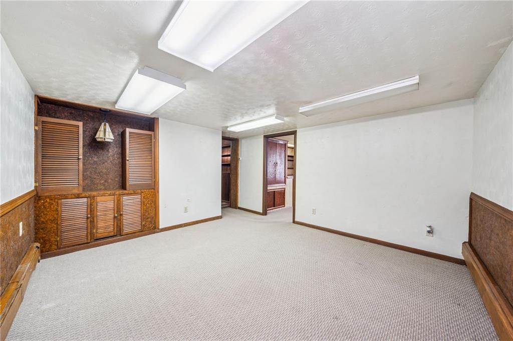 974 Renton Road Pittsburgh, PA 15239 - Photo 35 of 48 a view of an empty room with a window