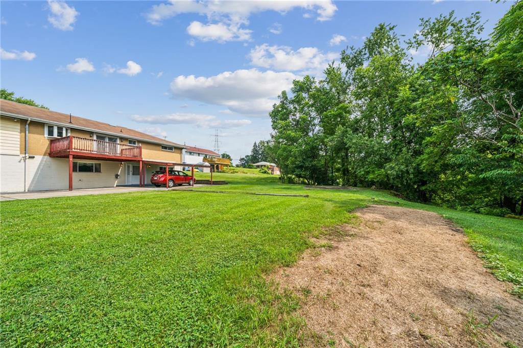 974 Renton Road Pittsburgh, PA 15239 - Photo 42 of 48 a view of a house with a big yard