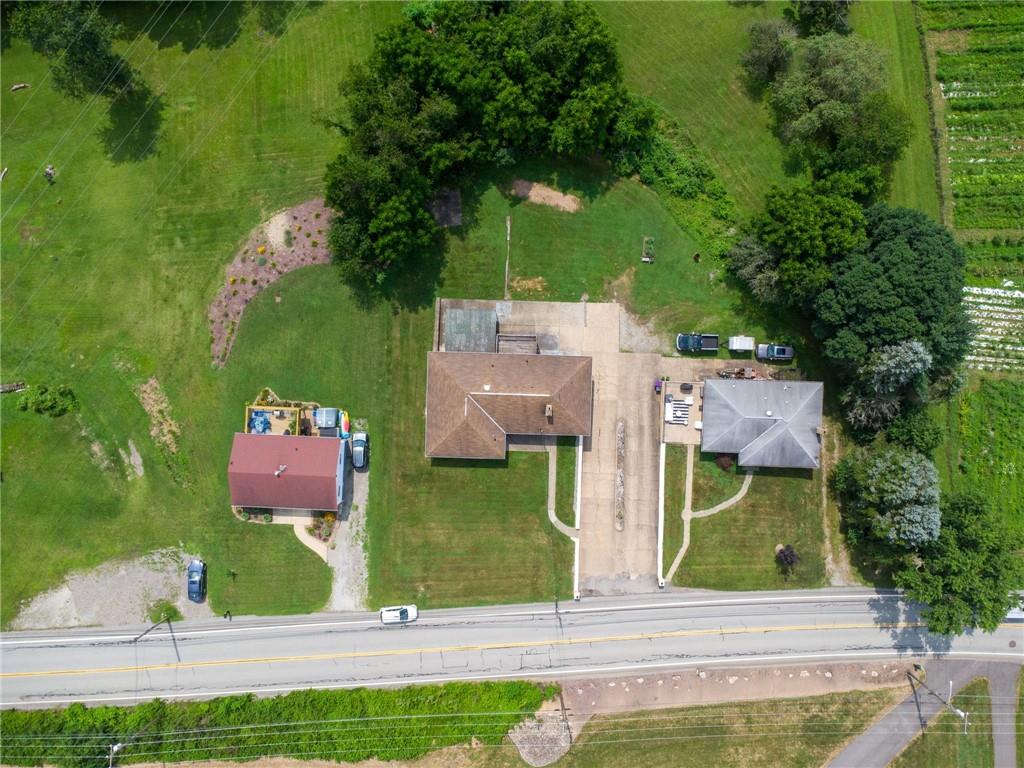 974 Renton Road Pittsburgh, PA 15239 - Photo 43 of 48 an aerial view of a house with a garden and trees