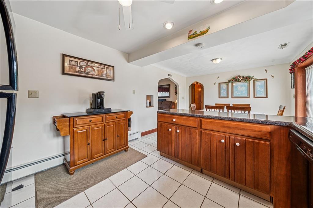 974 Renton Road Pittsburgh, PA 15239 - Photo 5 of 48 a spacious bathroom with a double vanity sink and a mirror