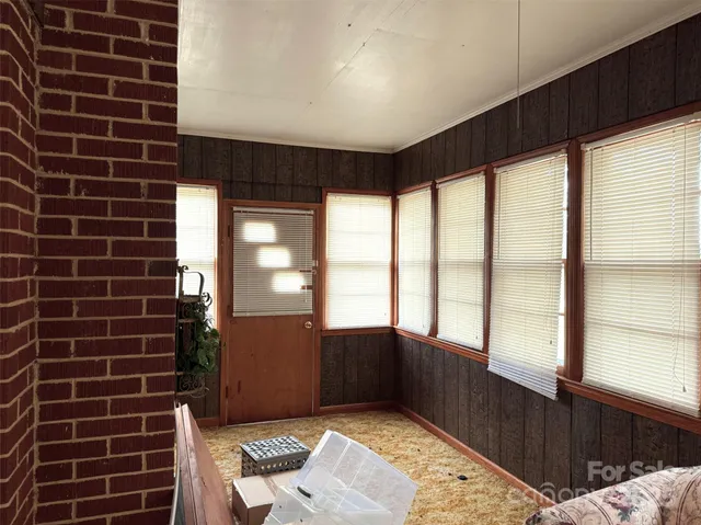 a view of an empty room and window