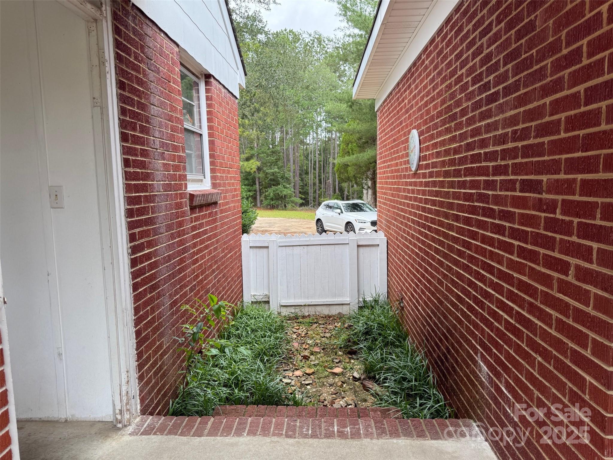 4463 Highway 52 Cheraw, SC 29520 - Photo 16 of 21 a view of a brick wall