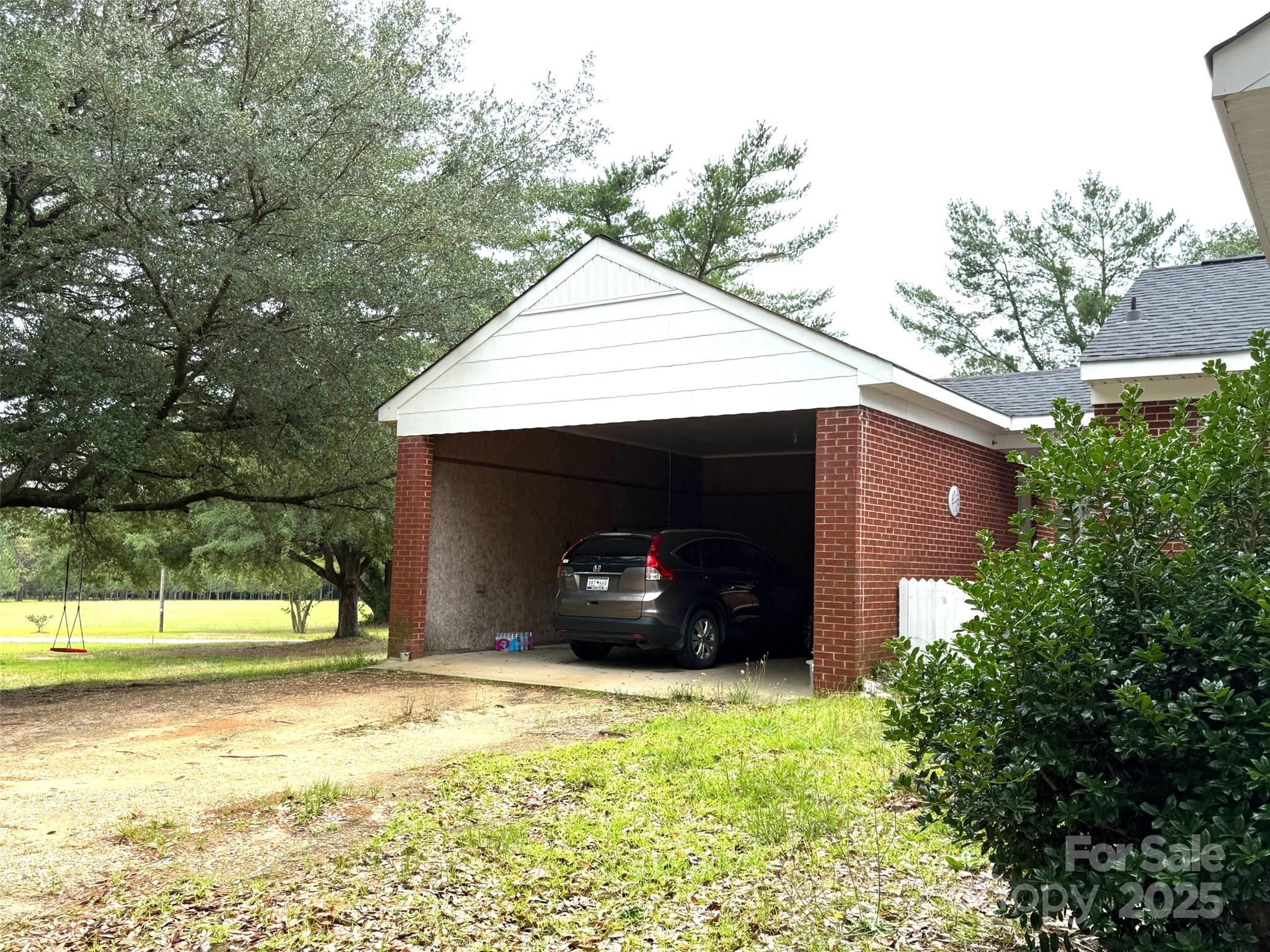 4463 Highway 52 Cheraw, SC 29520 - Photo 20 of 21 a view of a house with a yard