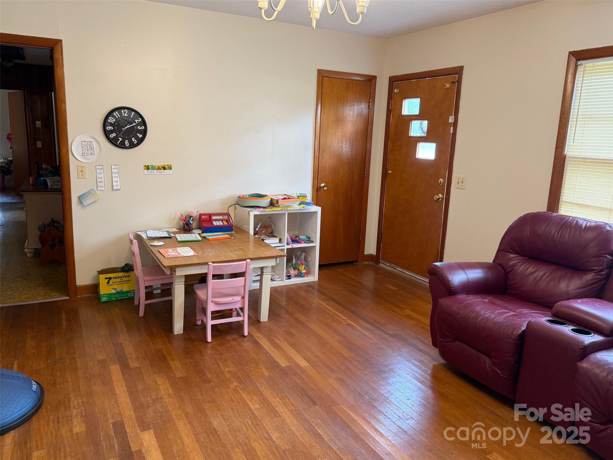 4463 Highway 52 Cheraw, SC 29520 - Photo 4 of 21 a living room with furniture and a wooden floor