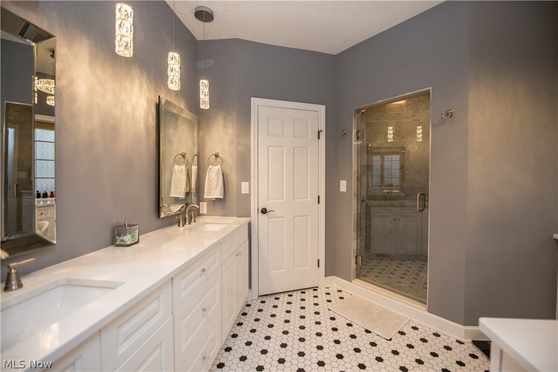 6155 Isley Road Northwest Canton, OH 44718 - Photo 23 of 35 Master bath with a large double vanity, walk in shower.