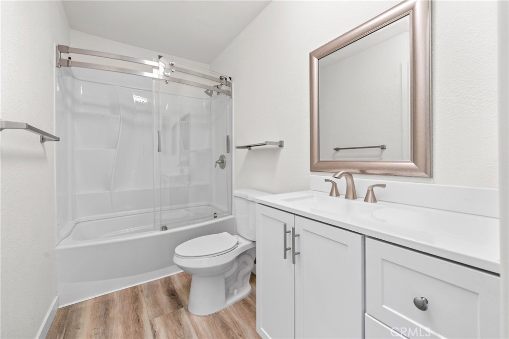 483 South Pine Street Orange, CA 92866 - Photo 7 of 14 a bathroom with a sink a toilet and shower