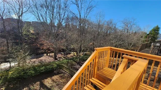 a view of balcony with a small yard