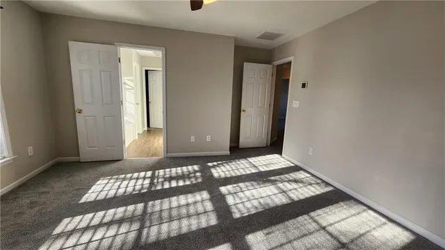 a bathroom with a tub and a window