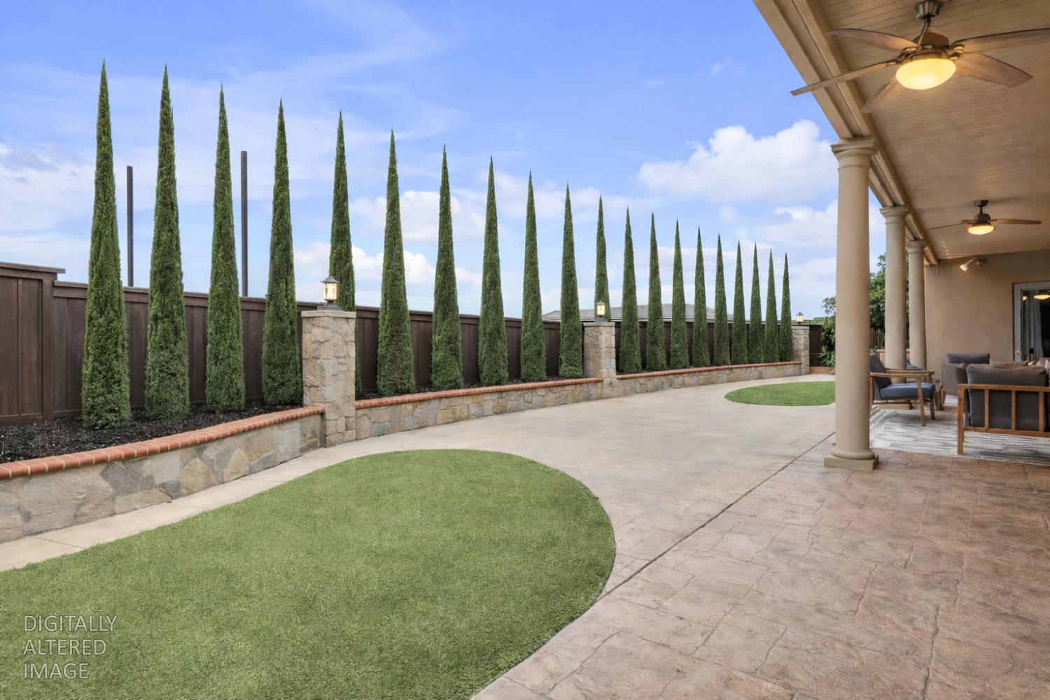 2173 Viola Way Roseville, CA 95661 - Photo 38 of 40 a view of swimming pool with lawn chairs and large trees