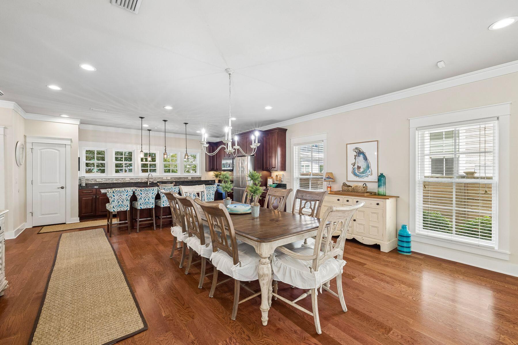 39 Willow Mist Road Inlet Beach, FL 32461 - Photo 8 of 41 a view of a dining room with furniture window and wooden floor