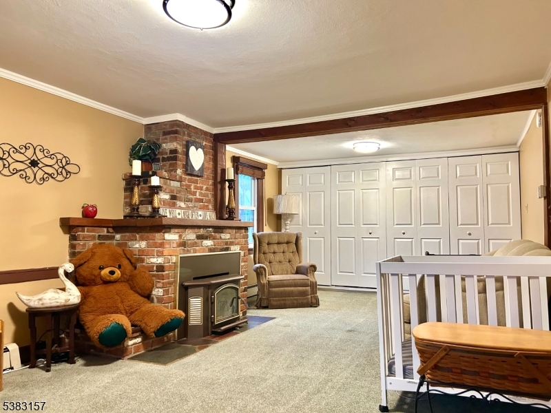 49 Brooklyn Road Stanhope, NJ 07874 - Photo 15 of 22 a view of a livingroom with furniture and windows