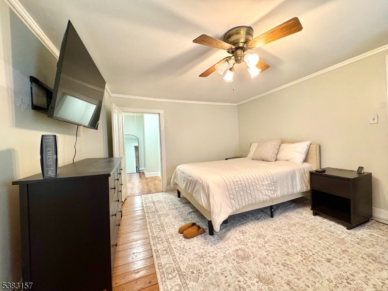 49 Brooklyn Road Stanhope, NJ 07874 - Photo 17 of 22 a bedroom with a bed and a flat screen tv