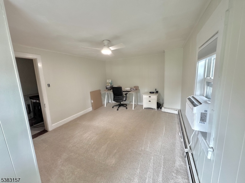 49 Brooklyn Road Stanhope, NJ 07874 - Photo 19 of 22 a livingroom with furniture and a flat screen tv