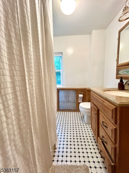 49 Brooklyn Road Stanhope, NJ 07874 - Photo 21 of 22 a bathroom with a sink a toilet a window and a shower