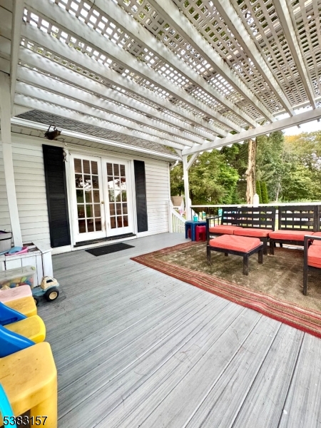 49 Brooklyn Road Stanhope, NJ 07874 - Photo 4 of 22 a backyard of a house with wooden floor and outdoor seating