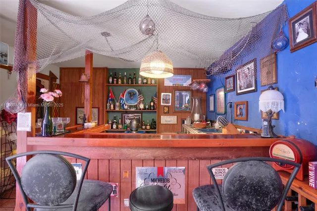 a room with lots of tables and chairs