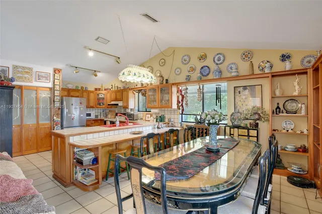 a view of a dining room with furniture