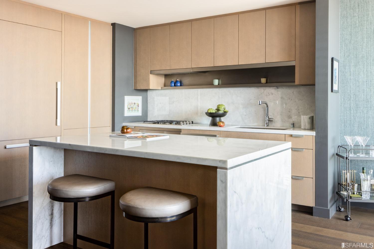 488 Folsom Street, Unit 4904 San Francisco, CA 94105 - Photo 2 of 21 a kitchen with a sink cabinets and window