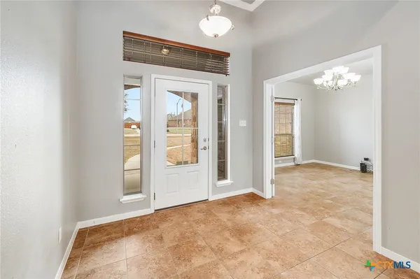 wooden floor and window in an empty room