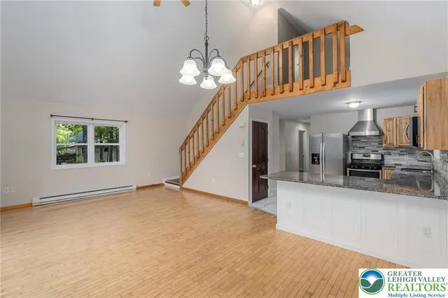 a view of a kitchen with a sink and dishwasher